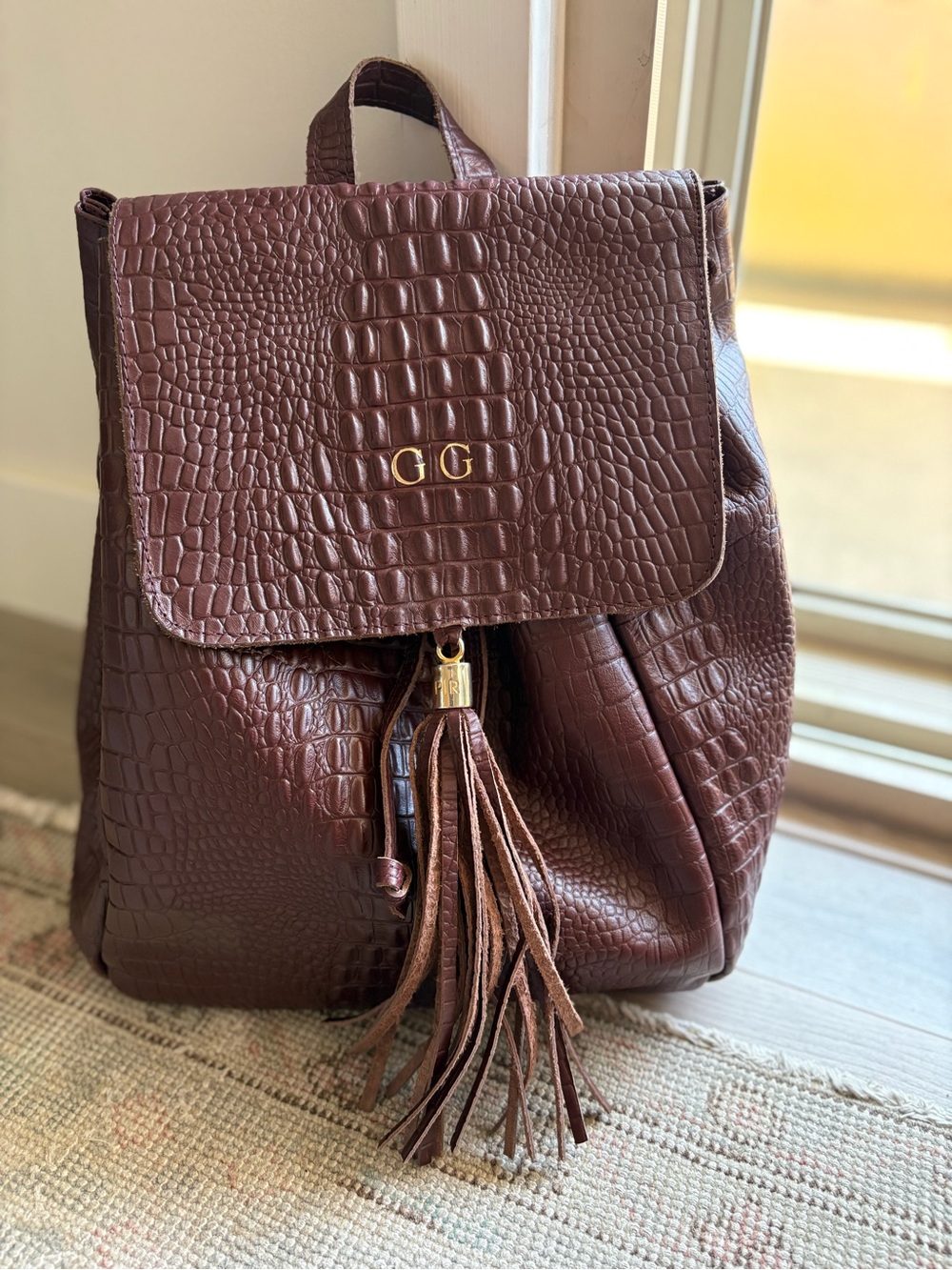 Anthropologie Croc-Embossed Brown Tassel Backpack
